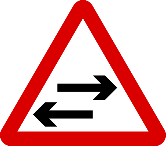 Two-way traffic crosses a one-way road